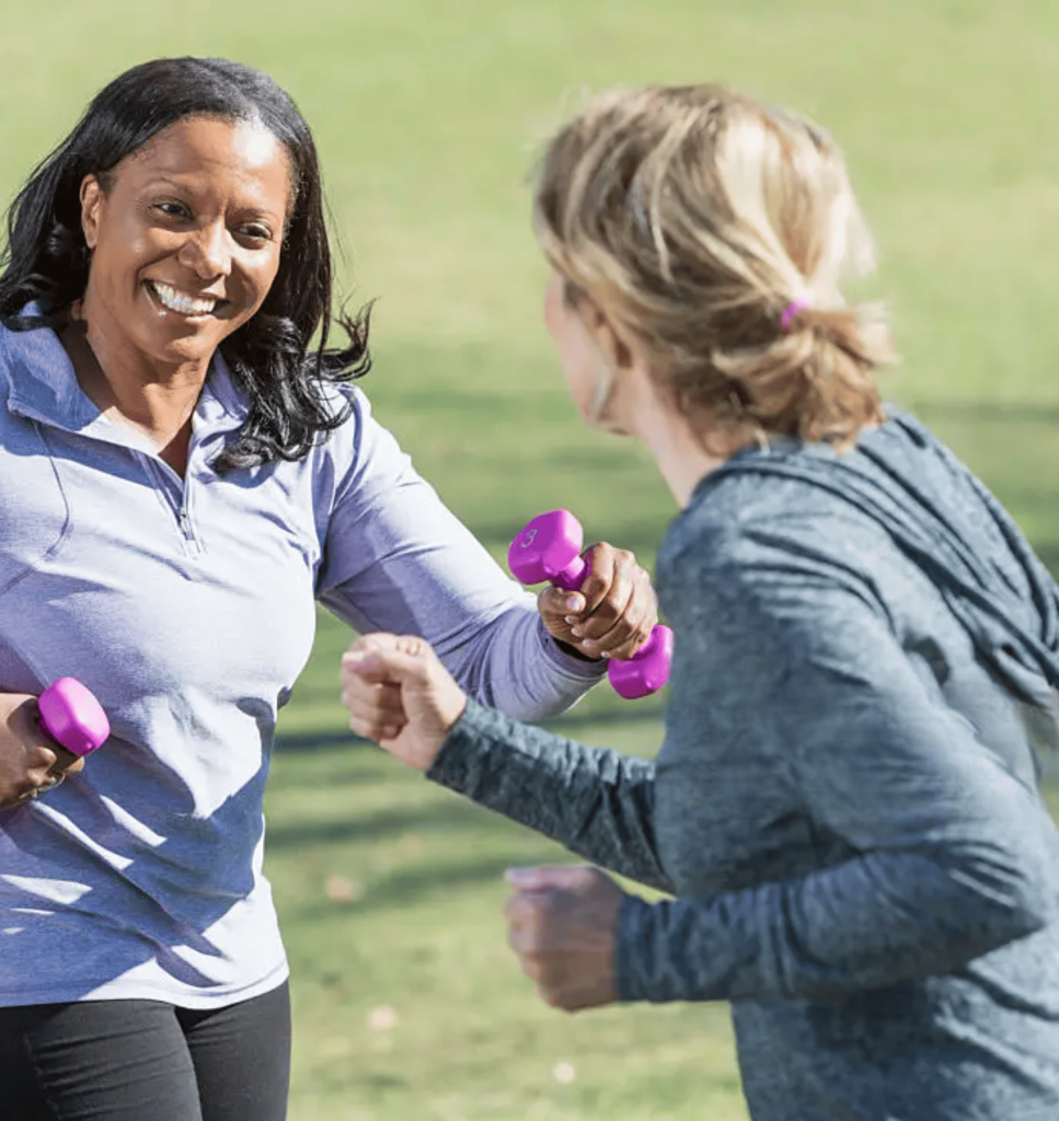 Supplements for Perimenopause: Happy women over 50 enjoying healthy aging and vitality outdoors.