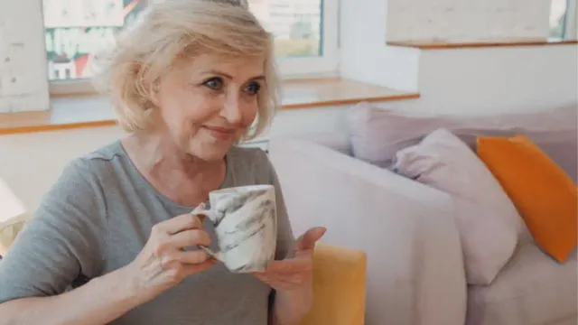 Morning routine for women over 50 starting with hydration and mindfulness.