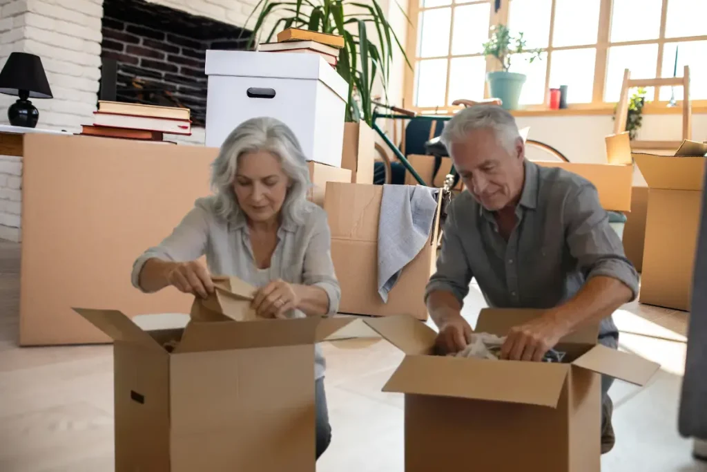 decluttering with a resistant partner mature couple teamwork