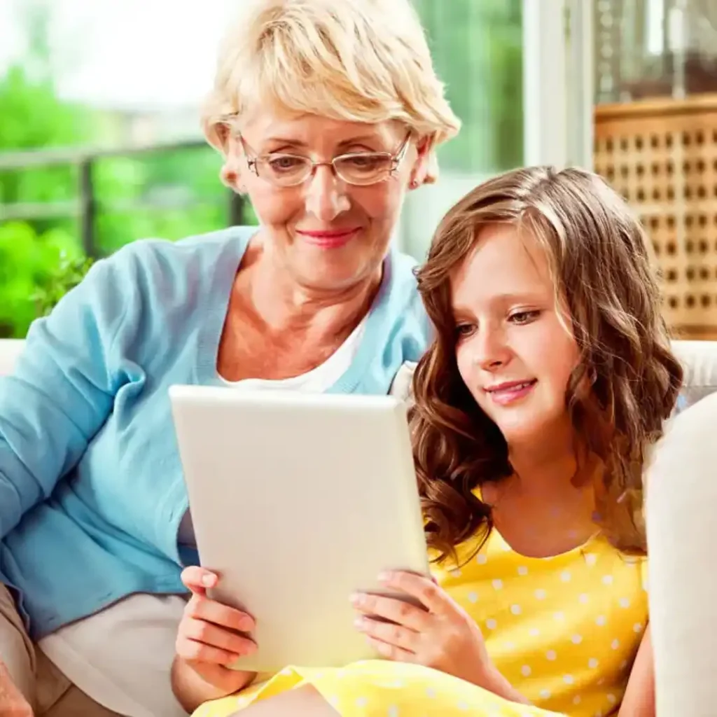 Great grandma reading to great-grandchild showing adapted engagement from grandma to great grandma role