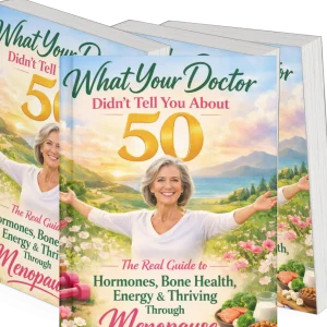 Multiple copies of the book "What Your Doctor Didn’t Tell You About 50" displayed together, featuring a woman over 50 and topics including menopause, hormones, bone health, energy, and healthy aging.